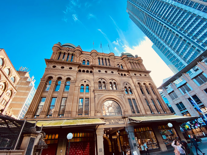 Sandstone exterior facade of the Queen Victoria Building in Sydney's CBD