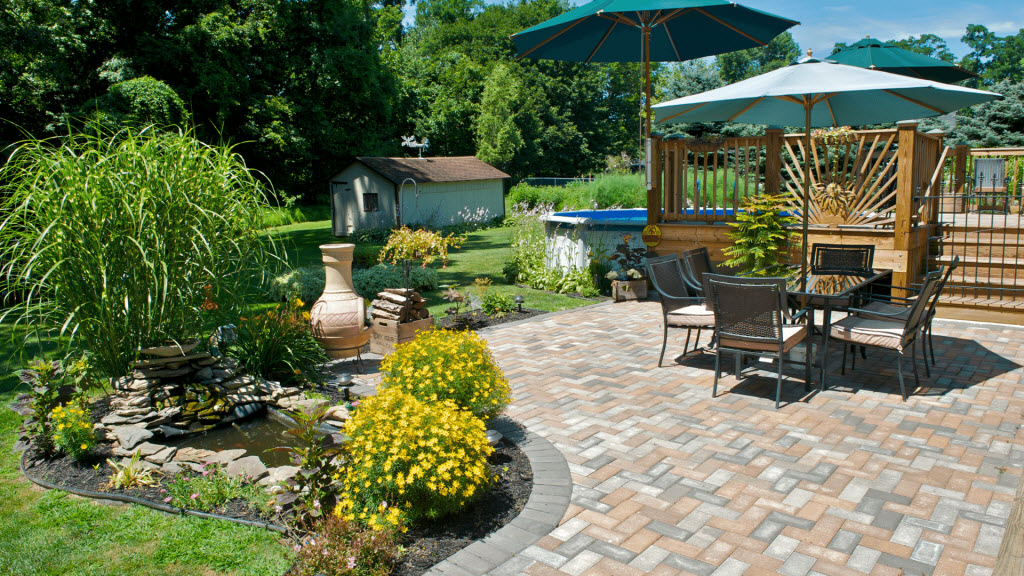 Paved outdoor patio with dining setting